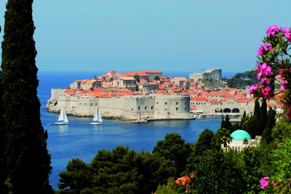 Yachts sailing past the walled city of Dubrovnik