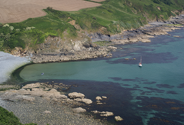 Yachts anchored at Porthallow beach