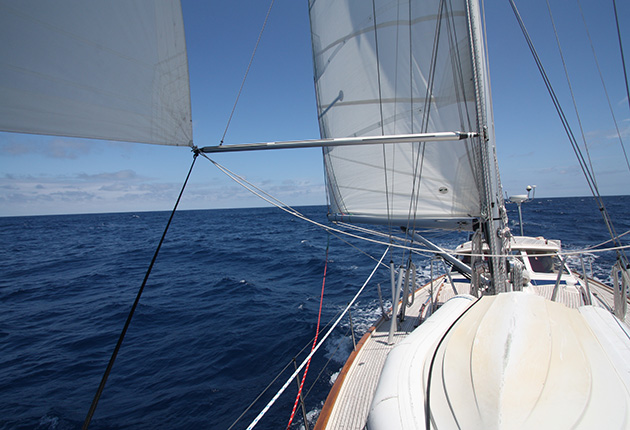 A yacht set up with a preventer on the sail