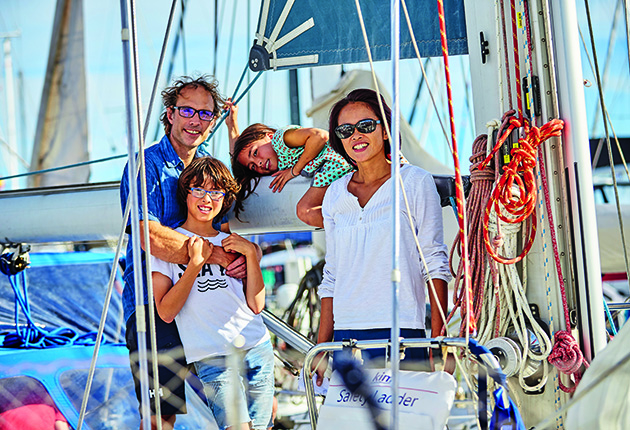 A family on the deck of their yacht before they left to cross the Atlantic