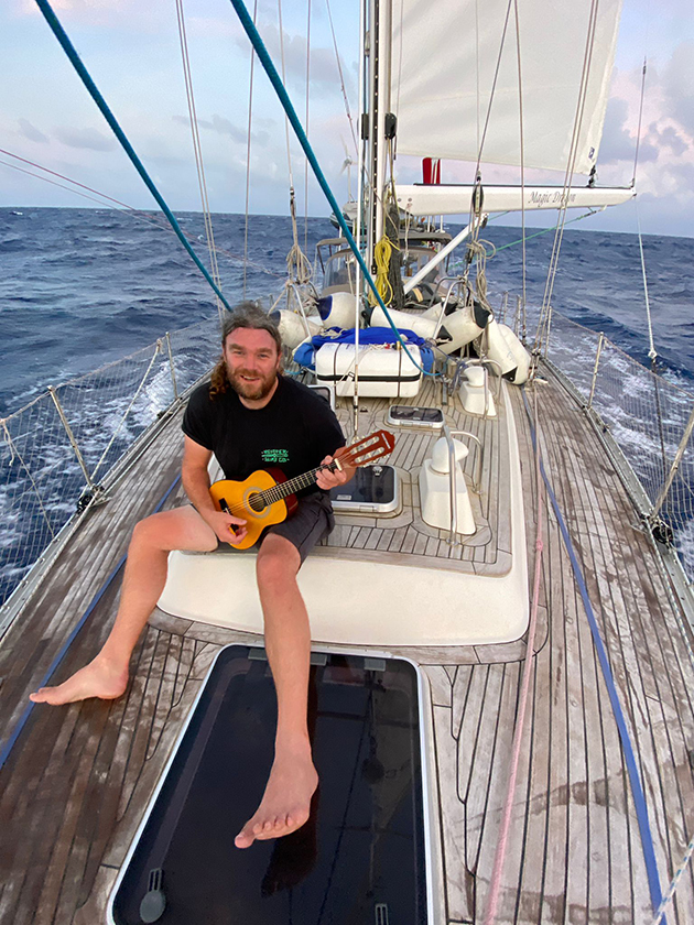 Craig plays Peter’s guitar on Magic Dragon’s foredeck