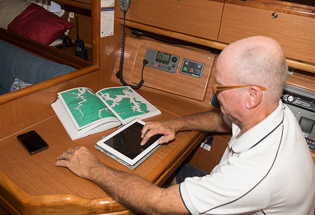 A man sitting at a chart table