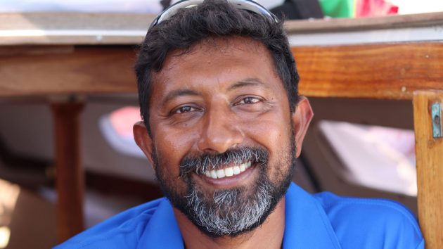 Golden Globe Race 2022 skipper Abhilash Tomy with sunglases on the top of his head