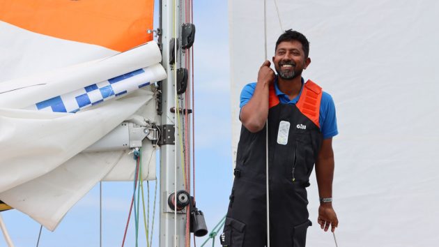 Sailor Abhilash Tomy holding a line