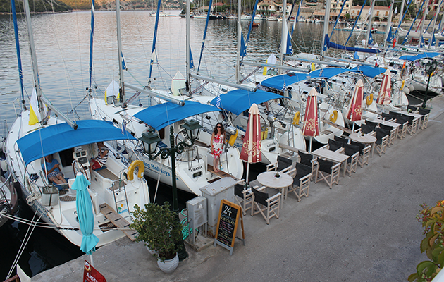 Yachts moored at a quay