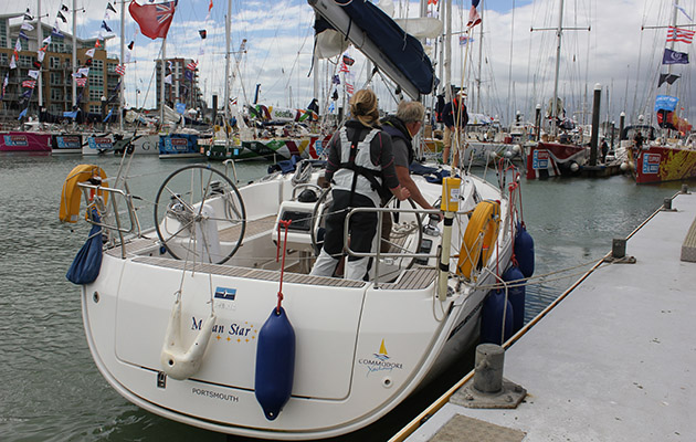 A yacht springing from a pontoon mooring
