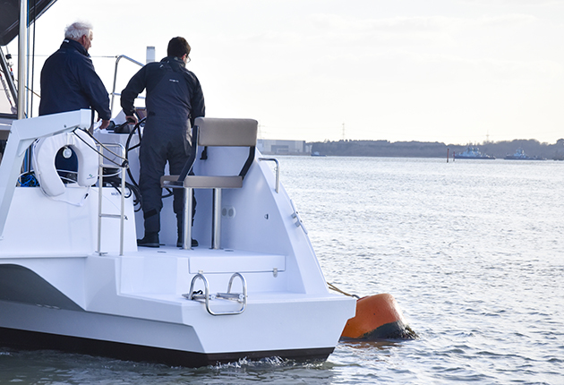 Catamaran mooring skills. It can be hard to see the buoy, so approaching with the stern quarter can make things easier