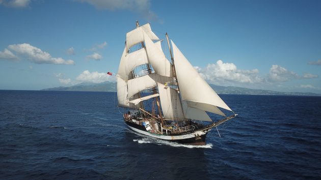 Pelican of London tall ship under full sail out in the ocean