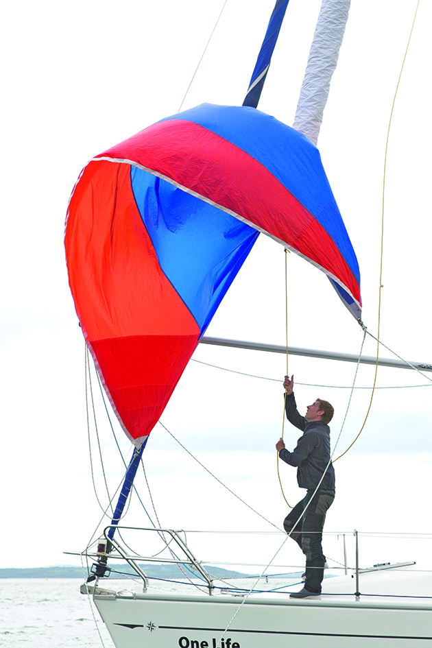 A sailor using a snuffer