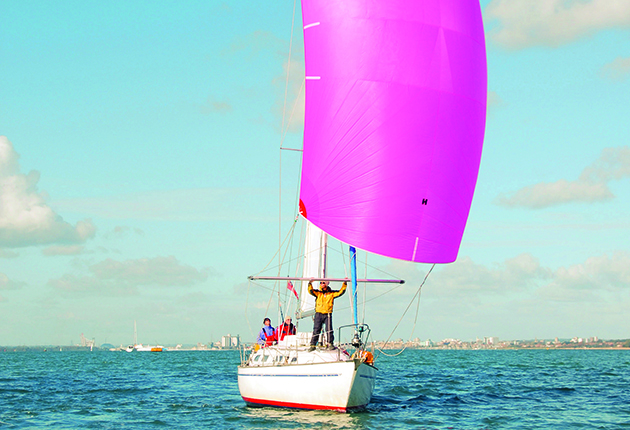 A sailor using an end for end gybe