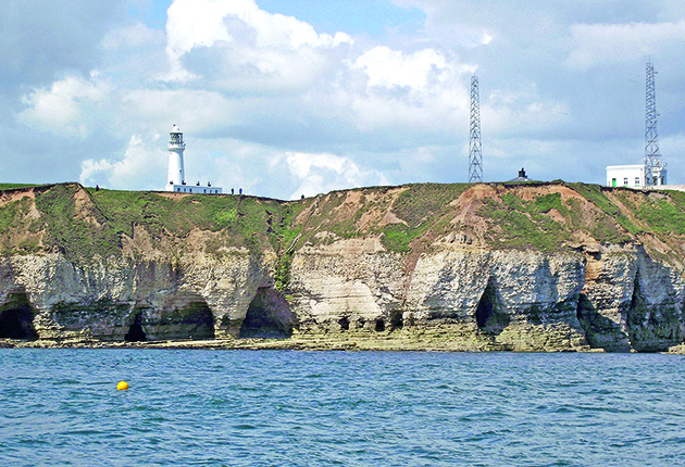 Judging distance at sea tip: If you can see people on land, you are inside one mile