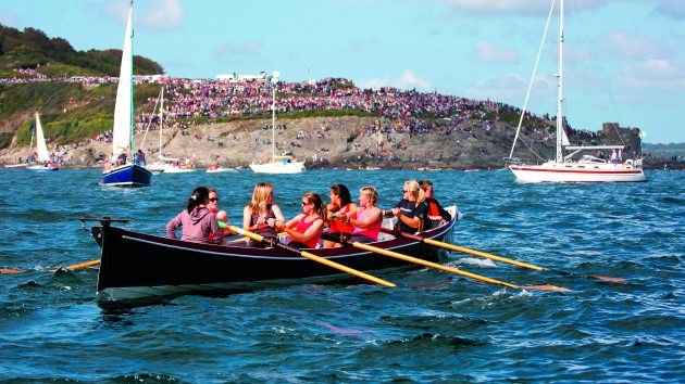 The annual World Pilot Gig Championships on the Isles of Scilly is the best time to see gigs in action. Credit: Roger Hollingsworth/Alamy Stock Photo