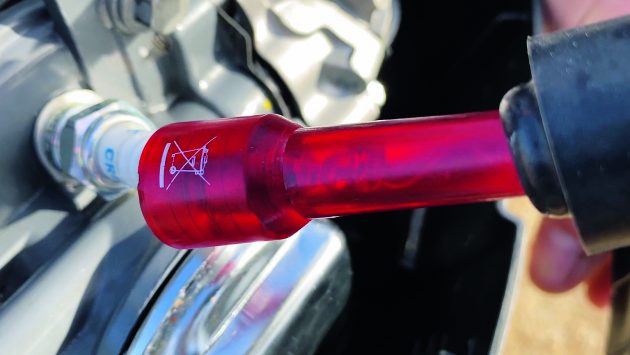 A spark plug from an outboard engine