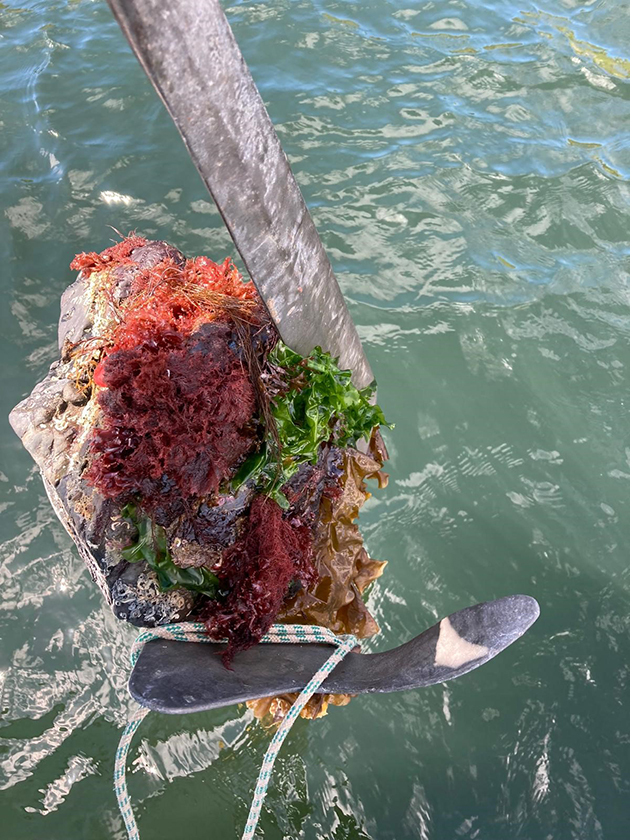 A rock on top of an anchor