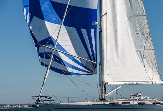 A spinnaker blowing in the wind