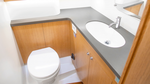 The forward heads are athwartships and separate to the aft shower compartment.