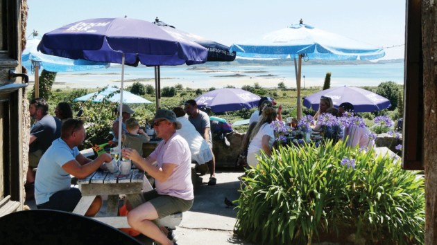 Dining room with a view: the terrace of the Seven Stones Inn on St Martin’s